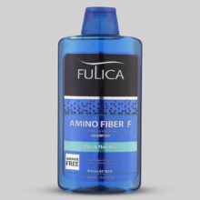 شامپو تقویت‌کننده مو فولیکا مخصوص موهای کم‌حجم و نازک، حجم 400 میلی‌لیتر مدل Amino Fiber، حاوی ویتامین‌های B7 و B6، بدون سولفات، برطرف‌کننده وز مو، آبرسان، محکم‌کننده، حاوی عصاره‌های سبوس برنج، رزماری